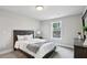 Cozy bedroom with plush carpet, natural light, and neutral colors for a relaxing ambiance at 3119 Stonegate Sw Dr, Atlanta, GA 30331