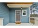 Inviting front porch featuring a stylish exterior door and charming 'hello' welcome mat at 3119 Stonegate Sw Dr, Atlanta, GA 30331