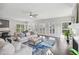 Open-concept living room and dining room with abundant natural light and stylish decor at 3119 Stonegate Sw Dr, Atlanta, GA 30331