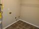 Utility room featuring a water heater, tile flooring, and a neutral wall color at 2649 Fieldstone View Se Ln, Conyers, GA 30013