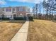 Charming townhome featuring traditional architecture and a neatly maintained front yard at 3180 Oakley Pl, Union City, GA 30291