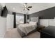 Bedroom features large window, tufted headboard, and neutral color palette at 4205 Rock Creek Dr, Cumming, GA 30028