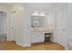 Bright bathroom with a vanity and a stool at 4335 Halifax Ne Ter, Roswell, GA 30075