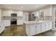 Modern kitchen with stainless appliances, granite countertops, and plenty of counter space at 4335 Halifax Ne Ter, Roswell, GA 30075