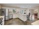 Well-lit kitchen with stainless steel appliances, granite countertops, and an eat-in breakfast area at 4335 Halifax Ne Ter, Roswell, GA 30075