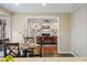 Cozy living room with fireplace and built-in bookshelves viewed from the kitchen at 4335 Halifax Ne Ter, Roswell, GA 30075