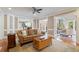 Bright and inviting living room showcasing classic trim work and an open floor plan leading to other rooms at 4335 Halifax Ne Ter, Roswell, GA 30075