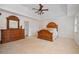 Beautiful main bedroom with wood furniture and a tray ceiling at 4335 Halifax Ne Ter, Roswell, GA 30075