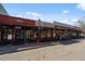 Street view of Roux, a local restaurant, with outdoor seating and a vibrant atmosphere at 4335 Halifax Ne Ter, Roswell, GA 30075