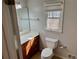 This is a bathroom featuring a window, toilet and vanity at 460 Rabbit Run, Mcdonough, GA 30252