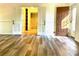 Bedroom with hardwood flooring and closet. There's a view of the bathroom through the bedroom doorway at 460 Rabbit Run, Mcdonough, GA 30252