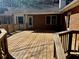 Expansive wooden deck offers plenty of space for outdoor living and entertaining at 460 Rabbit Run, Mcdonough, GA 30252