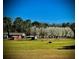 Picture of the entire property, including plenty of land, open field and trees plus horses at 460 Rabbit Run, Mcdonough, GA 30252