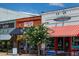 A variety of storefronts showcasing the architectural diversity and charm of Macon Street Tacos at 460 Rabbit Run, Mcdonough, GA 30252