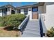 Inviting entrance to the property with a tidy landscape and well-maintained stairs at 1891 Donald Dr, Marietta, GA 30062