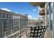 Lovely view from a cozy condo balcony, with metal furniture and a relaxing outdoor space at 400 W Peachtree Nw St # 1408, Atlanta, GA 30308