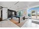 Beautiful game room with a pool table, dart board, and city views at 400 W Peachtree Nw St # 1408, Atlanta, GA 30308