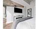 Stylish main bedroom featuring city views and sleek furniture arrangement at 400 W Peachtree Nw St # 1408, Atlanta, GA 30308