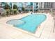 Inviting outdoor pool area with a hot tub and ample space for relaxation at 400 W Peachtree Nw St # 1408, Atlanta, GA 30308