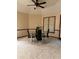 Cozy dining room featuring wainscoting, a glass-top table, and light neutral-toned paint at 5207 W Shore Sw Dr, Conyers, GA 30094