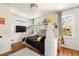 bedroom with bunk bed, desk, hardwood floors, and great natural light at 10528 Serenbe Ln, Chattahoochee Hills, GA 30268