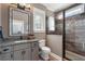 Elegant bathroom featuring a glass shower, a large mirror, and a vanity with granite countertops and fixtures at 5222 N Helton Rd, Winston, GA 30187
