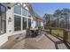 Large deck with outdoor seating, ideal for enjoying the backyard views and outdoor living at 5222 N Helton Rd, Winston, GA 30187