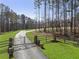 A gated entrance and long driveway provides privacy for this spectacular home at 5222 N Helton Rd, Winston, GA 30187