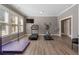 Bright workout room with large windows, exercise equipment, and space for fitness activities at 5222 N Helton Rd, Winston, GA 30187