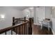 Well-lit hallway features hardwood floors and a charming study nook, creating a versatile and inviting space at 5222 N Helton Rd, Winston, GA 30187
