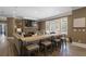 Comfortable living room boasts a stone fireplace, built-in shelving, and a cozy seating area with natural light at 5222 N Helton Rd, Winston, GA 30187