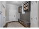 Elegant mudroom features custom storage cabinets and a built-in bench at 5222 N Helton Rd, Winston, GA 30187