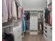 Organized walk-in closet features custom shelving and ample storage space, offering a practical and stylish storage solution at 5222 N Helton Rd, Winston, GA 30187