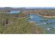 Stunning aerial view of Lake Lanier with covered boat docks and lush green trees, perfect for lake enthusiasts at 5400 Kings Camp Rd Se B-34, Acworth, GA 30102