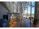 Inviting back deck with lake views offers a seamless transition between indoor and outdoor living spaces at 5400 Kings Camp Rd Se B-34, Acworth, GA 30102
