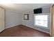 Bedroom featuring hardwood floors and a window to let in light at 5400 Kings Camp Rd Se B-34, Acworth, GA 30102