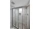 Updated shower with glass doors and unique pebble flooring at 5400 Kings Camp Rd Se B-34, Acworth, GA 30102