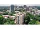 Aerial view of the condo and surrounding area with skyline view in the background at 1 Biscayne Nw Dr # 706, Atlanta, GA 30309