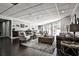 Community room featuring a kitchenette, tables, chairs, sofas, and decor at 1 Biscayne Nw Dr # 706, Atlanta, GA 30309