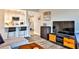 Open concept living space featuring breakfast bar, modern furnishings, and hardwood floors at 1 Biscayne Nw Dr # 706, Atlanta, GA 30309