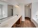 Bathroom with a double sink vanity, marble countertop, and a bathtub with a shower at 3451 Meadow Grass Dr, Dacula, GA 30019