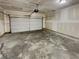 Spacious two car garage featuring an automatic garage door opener at 3451 Meadow Grass Dr, Dacula, GA 30019