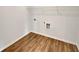 Clean laundry room featuring light brown wood-look floors and washer-dryer hookups at 3451 Meadow Grass Dr, Dacula, GA 30019
