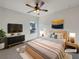 Cozy main bedroom featuring soft carpeting, a ceiling fan, and tasteful decor at 3451 Meadow Grass Dr, Dacula, GA 30019