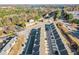 An aerial view of townhomes with assigned parking spaces and mature trees at 3462 Mount Zion Rd, Stockbridge, GA 30281