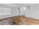 Living room featuring wood floors and a large window at 3462 Mount Zion Rd, Stockbridge, GA 30281