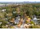 Residential neighborhood with tree coverage, well-maintained lawns and homes; Atlanta skyline in distance at 567 E Wesley Ne Rd, Atlanta, GA 30305