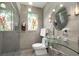 Modern bathroom with glass shower, decorative window, and glass sink at 567 E Wesley Ne Rd, Atlanta, GA 30305