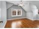 Bright bedroom with hardwood floors, neutral walls, and plenty of natural light from the large windows at 567 E Wesley Ne Rd, Atlanta, GA 30305