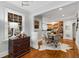 Open concept dining room and kitchen with hardwood floors and natural light at 567 E Wesley Ne Rd, Atlanta, GA 30305